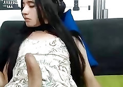 Shemale shows off her big cock before enjoying sensual masturbation