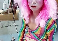 Transgender Le wears sexy clothes and plays cups of sex. Artificial cans