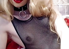 Hot blonde tranny in a cute lingerie top jerks off