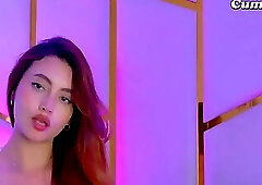 Vibrant Red Locks and Rosy Touches