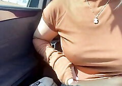 Alone in the car in Spain, enjoying a nasty pont of time. Flashing my natural and milky breasts with a hard nipp