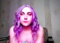 Cute sissy Crossdresserkitty twirling in a sparkly princess sundress