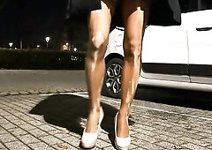 crossdresser piddle in wolford neon 40 with supermini in the parking lot