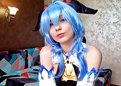 Fantasy cosplay girl rides a pink dildo on a colorful couch