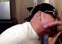 Homemade DILF sucks ands wanks penis through gloryhole
