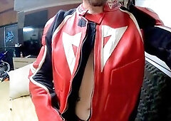 Fit guy in leather suit does a sexy striptease and masturbation with his giant cock