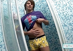 Horny brunette twink Bryan I stuffs his tight asshole with a massive dildo!