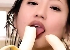 Sultry Asian beauty reveals her curves and touches herself