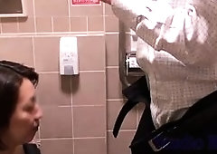 Big breasted Oriental lady milks a young cock with her mouth