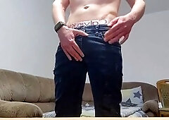 Young dude in jeans strokes his massive 20 cm cock