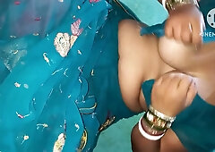 Indian woman explores her clit with blue nails during intimate foreplay