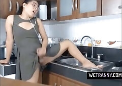 Stunning Latina shemale Skarleeth gets herself off in the kitchen