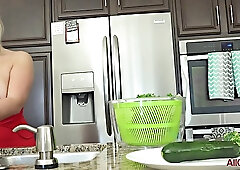 Katy Jayne is a busty blonde mature, who seems to like masturbating with vegetables, in the kitchen