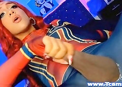 Transgender babe in sexy costume masturbates her cock