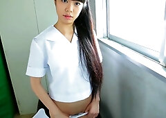 Japanese girl Mei films herself sucking on a candy then slowly lifts her skirt to reveal white cotton panties