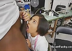 Black guy got a blowjob from a sexy, Asian tailor and then he fucked her ass