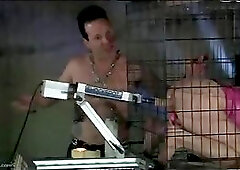 Caged Bitch Fucked By A Machine!