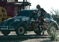Mrs Samantha visits the city of Winslow Arizona, made illustrious by the Eagles song 'Take it Facile'. Driving in her red Mustang convertibl