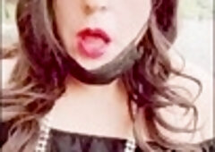 JoanaLoveTs shows off in a dark dress during the day