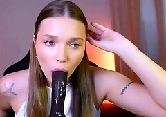 Brunette Teen Deepthroats Massive Black Dildo Live on Stream