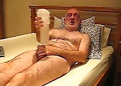 Old Bear Pumping Cock On A Bed