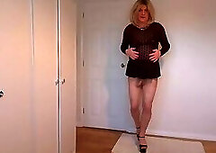 Miniskirt and nude pantyhose