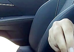 Brunette peeks from her car pulling herself up to get a better look at my bwc, just before I cum. Original video.