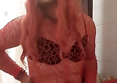 Red Sissy plays with her clit and cum