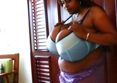 Busty curly brunette with big boobs fucks on couch