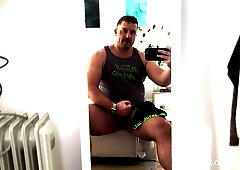 Wooly muscle cub Koby Falks canes his phat uncircumcised pipe and blasts onto a pair of Bonds boxers