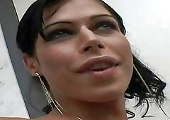 Cute brunette shemale enjoys a black boner in her ass