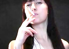 Hot lengthy hair slim playgirl dancing and smokin' stripped with her pretty natural titties and her sexy youthful body.