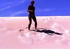 Tanned guy on beach in tiny string thong (temporarily!)