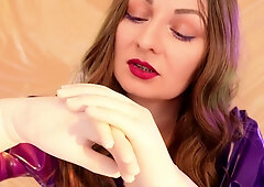 Arya Grander explores her curvy frame in purple latex and fetish gloves
