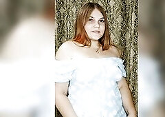 juicy redheaded girl in a gorgeous dress