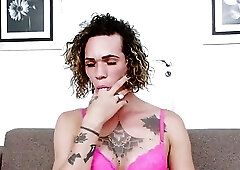 Filthy tattooed shemale enjoys masturbation and playing with her balls