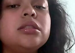 Large tit Latin babe sucks off big toy