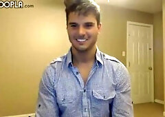 Horny Clark Bates masturbates with his legs spread wide