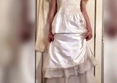 Trying on my vintage satin wedding costume with a skirt and glossy hose.