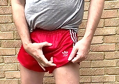 Sport shorts, shorts bulge, cock out