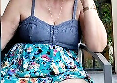 Wife Connie flashing on the hotel bacony.