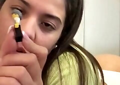 Cute giantess plays with her small toys