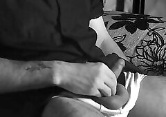 The boy jerks off close-up with a condom and cums loudly into it&period;