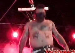 Mature inked BDSM lover shows off BDSM skills on stage