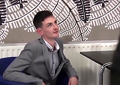 Successful young businessmen banging at the office