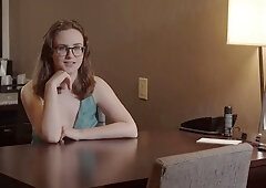 An artist gets painted by a suspended model