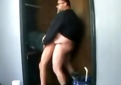 A stranger Arched over in the closet and poked me in the bum