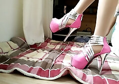 Chinese femdom mistress in stilettos slowly milks a kneeling man's cock with her shoe until he cums helplessly on her polished sole