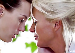 Stunning babes Kathy Anderson and Charli Red are kissing and playing