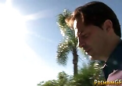 Lingerie wearing busty cock whore gives a handie in behind the scenes shoot